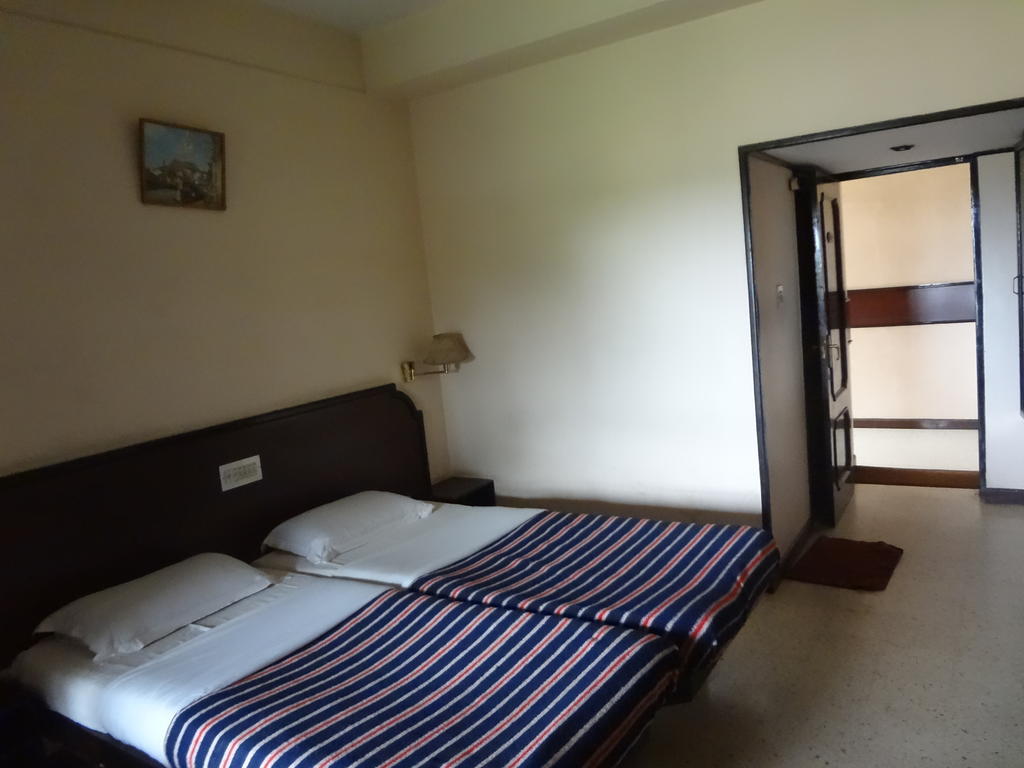 Hotel New Rajdarshan Madikeri Quarto foto
